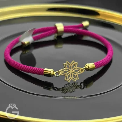 دستبند مارشال صورتی با پلاک طلای گل