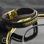 دستبند چرم بافت با کارتیه طلا