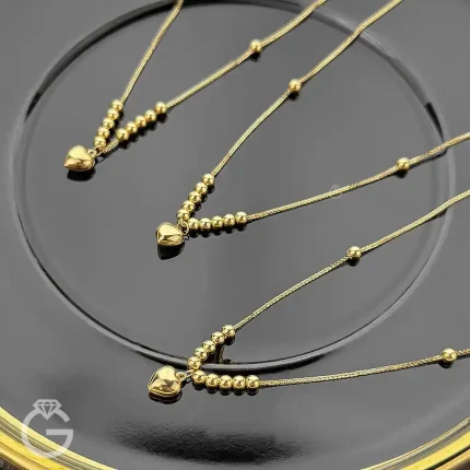 گردنبند طلای قلب و گوی
