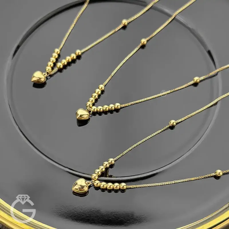 گردنبند طلای قلب و گوی