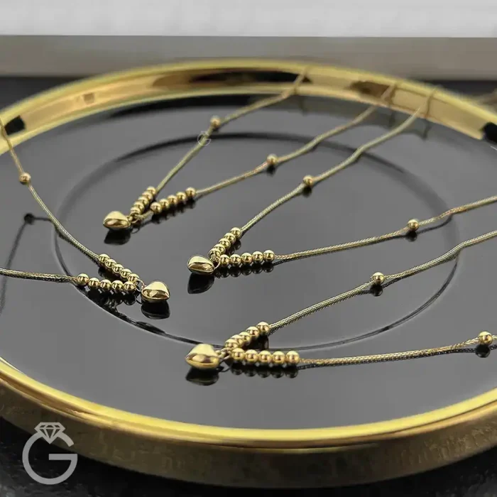 گردنبند طلای قلب و گوی