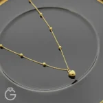 گردنبند طلای قلب و گوی دو