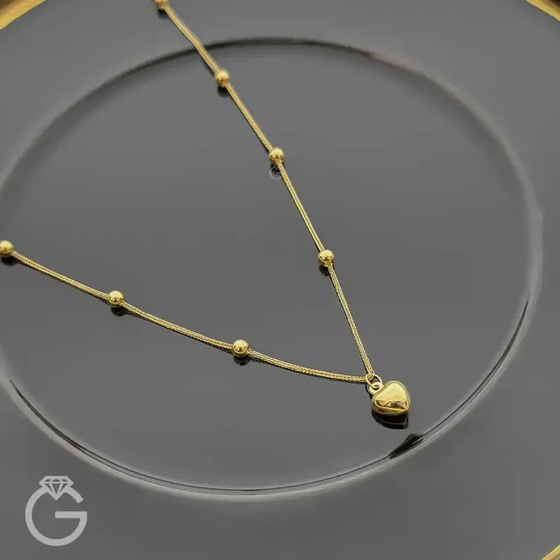 گردنبند طلای قلب و گوی دو