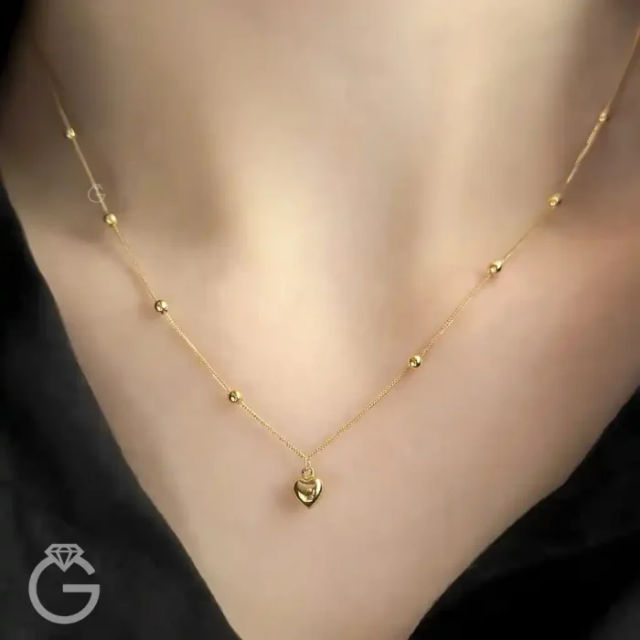 گردنبند طلای قلب و گوی دو