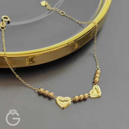 دستبند طلای قلب و گوی