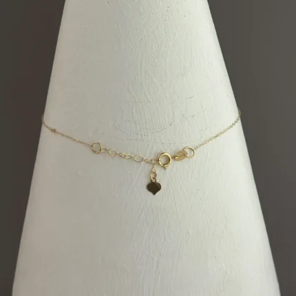 دستبند طلای قلب و هرمس و گوی
