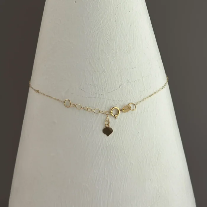 دستبند طلای قلب و هرمس و گوی